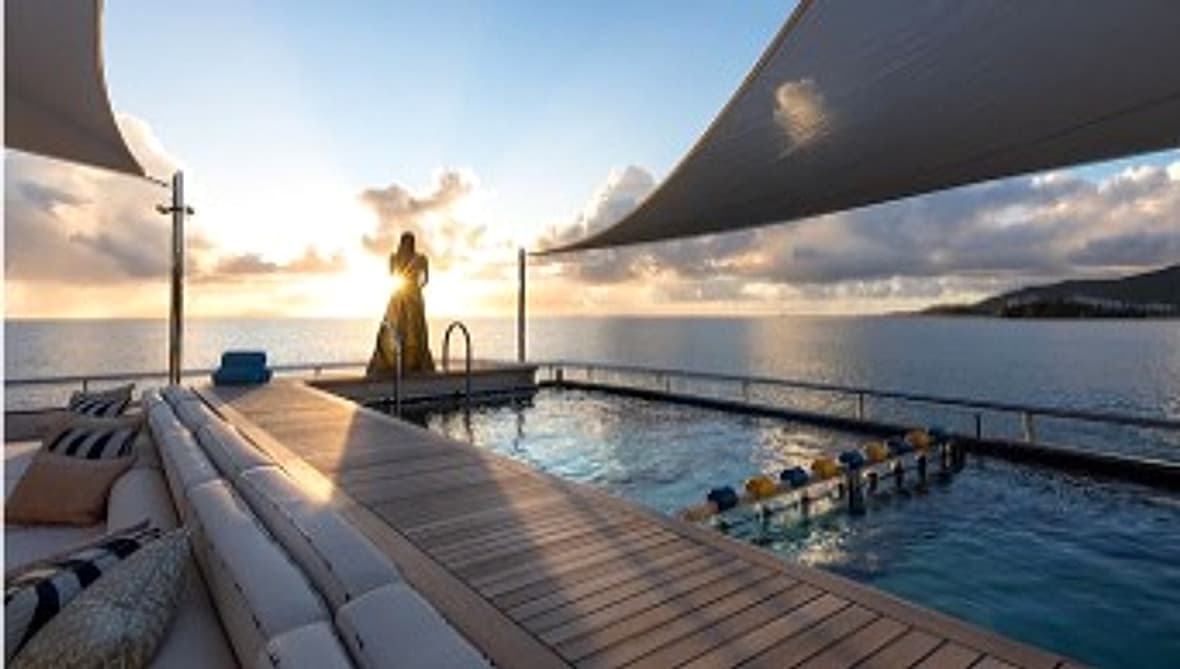 Yacht deck at sunset with water access and tender equipment